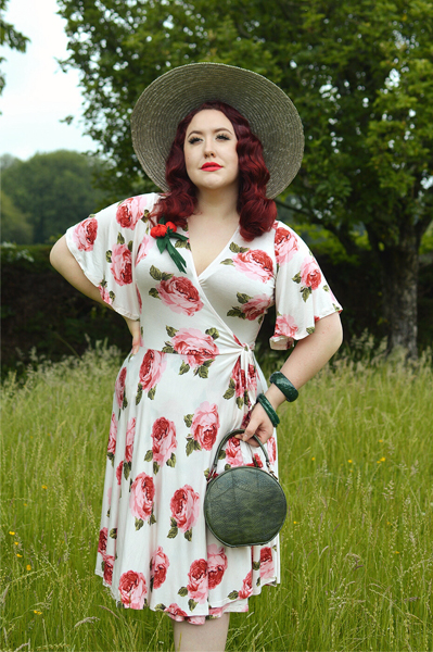 Plus size pinup Miss Amy May models the Rose Cream Aurora Dress gifted by Wax Poetic Clothing for a fit and size review