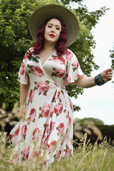 Plus size pinup Miss Amy May models the Rose Cream Aurora Dress gifted by Wax Poetic Clothing for a fit and size review