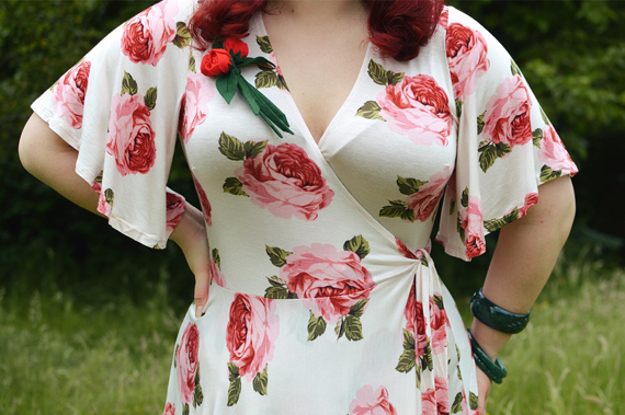 Plus size pinup Miss Amy May models the Rose Cream Aurora Dress gifted by Wax Poetic Clothing for a fit and size review