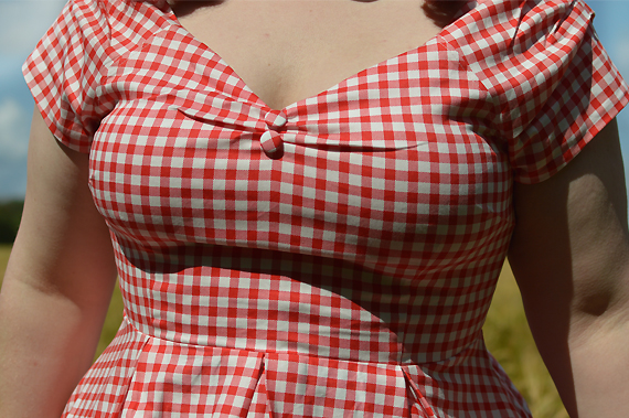 Plus size pinup Miss Amy May models the Red gingham off the shoulder Lily dress by Dolly & Dotty for a fit and size review