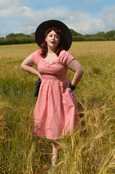 Plus size pinup Miss Amy May models the Red gingham off the shoulder Lily dress by Dolly & Dotty for a fit and size review