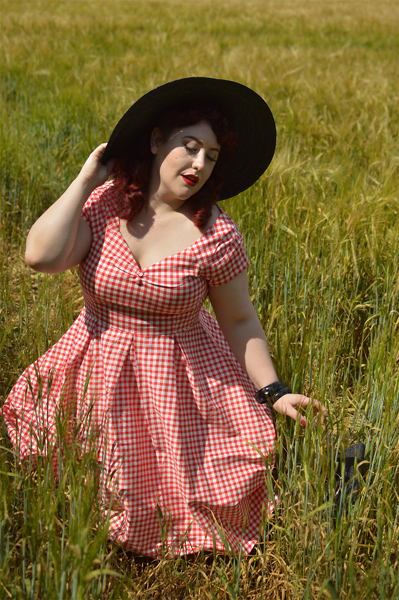 Plus size pinup Miss Amy May models the Red gingham off the shoulder Lily dress by Dolly & Dotty for a fit and size review