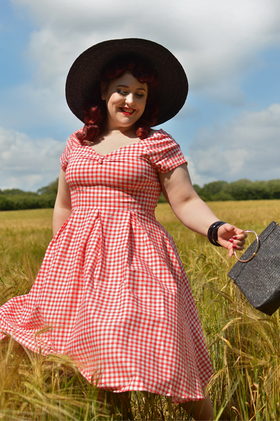 Plus size pinup Miss Amy May models the Red gingham off the shoulder Lily dress by Dolly & Dotty for a fit and size review