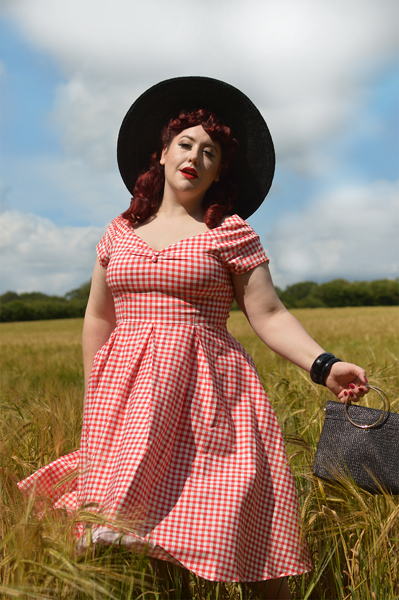 Plus size pinup Miss Amy May models the Red gingham off the shoulder Lily dress by Dolly & Dotty for a fit and size review