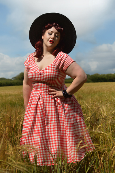 Plus size pinup Miss Amy May models the Red gingham off the shoulder Lily dress by Dolly & Dotty for a fit and size review