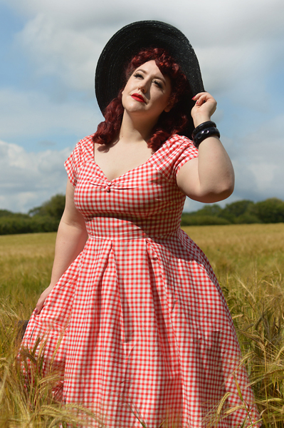 Plus size pinup Miss Amy May models the Red gingham off the shoulder Lily dress by Dolly & Dotty for a fit and size review