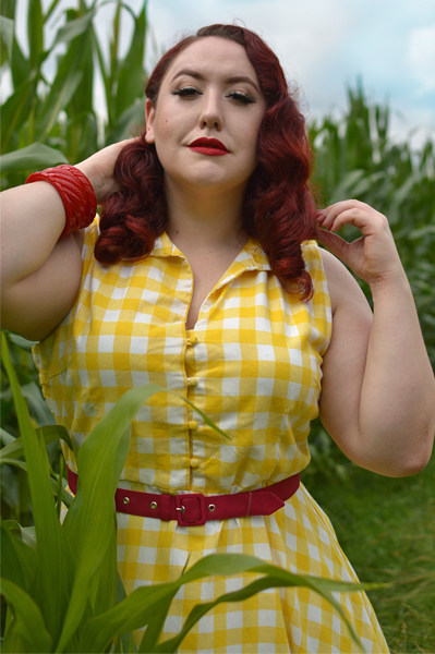 Plus size pinup Miss Amy May models the Poppy Yellow Gingham Shirtdress gifted by Dolly & Dotty for a fit and size review