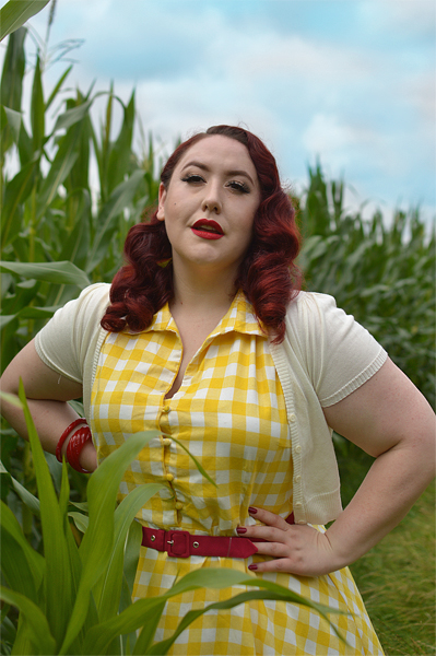Plus size pinup Miss Amy May models the Poppy Yellow Gingham Shirtdress gifted by Dolly & Dotty for a fit and size review