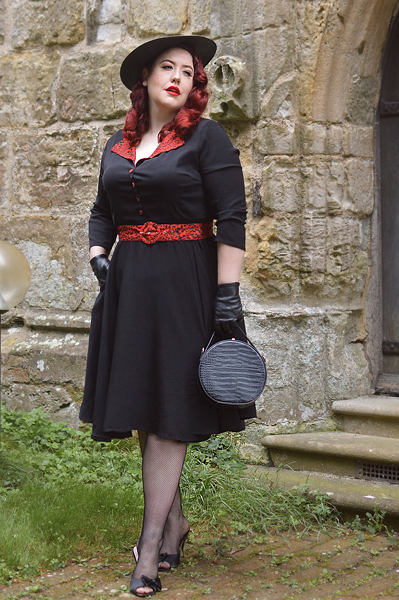 Plus size pinup Miss Amy May models the Lynette Animal print dress by Timeless London for a fit and sizing review