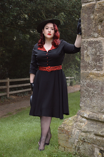 Plus size pinup Miss Amy May models the Lynette Animal print dress by Timeless London for a fit and sizing review