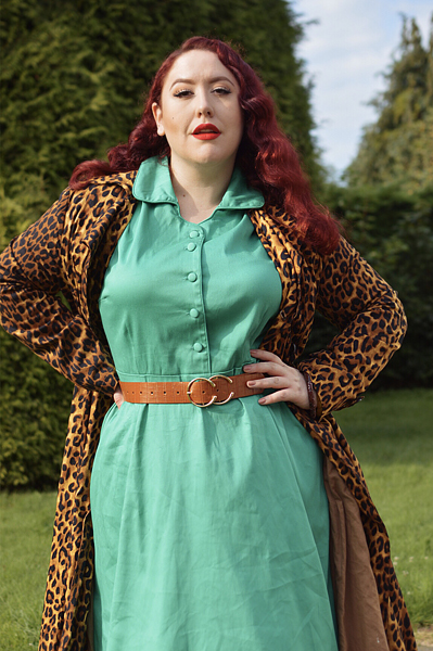Plus size pinup Miss Amy May models the green Penelope shirt dress gifted by Dolly & Dotty for a fit and size review