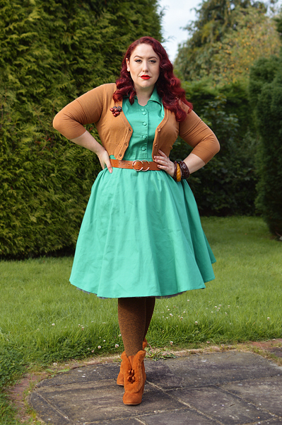 Plus size pinup Miss Amy May models the green Penelope shirt dress gifted by Dolly & Dotty for a fit and size review