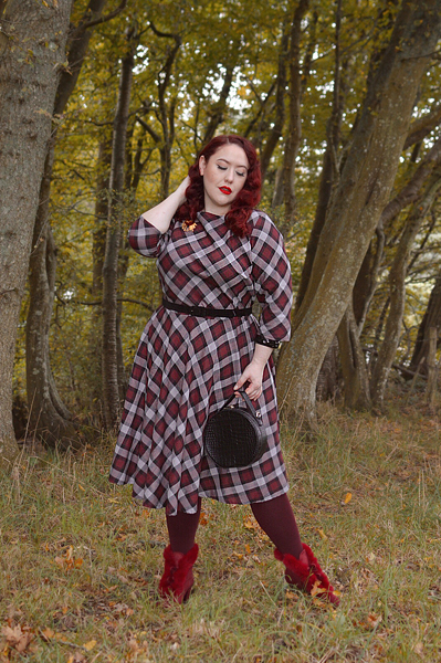 Plus size pinup Miss Amy May models the burgundy and grey plaid Devon swing dress for a fit and sizing review