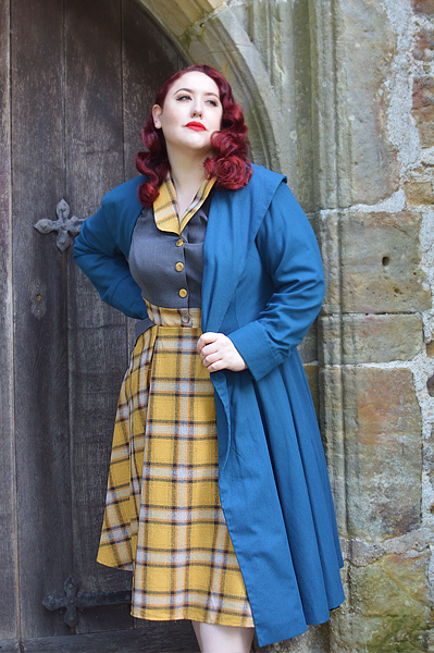 Plus size pinup Miss Amy May models the Isolde-Sun dress by Miss Candyfloss for a fit and size review