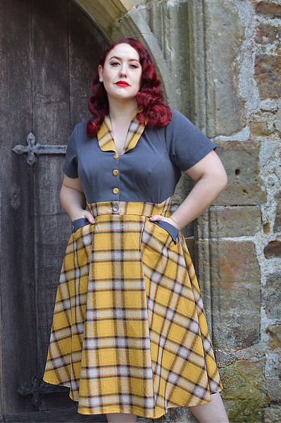 Plus size pinup Miss Amy May models the Isolde-Sun dress by Miss Candyfloss for a fit and size review