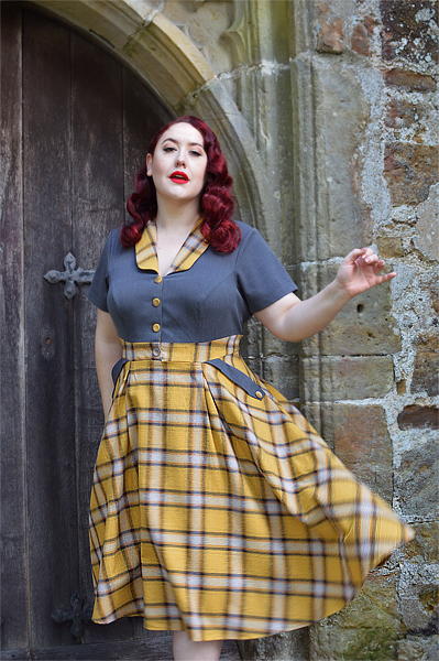 Plus size pinup Miss Amy May models the Isolde-Sun dress by Miss Candyfloss for a fit and size review