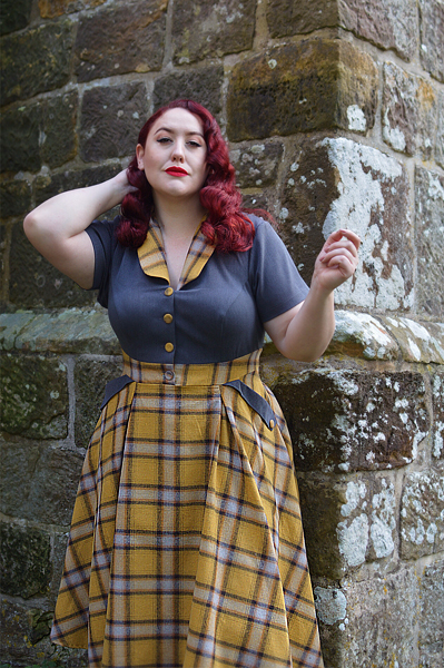 Plus size pinup Miss Amy May models the Isolde-Sun dress by Miss Candyfloss for a fit and size review