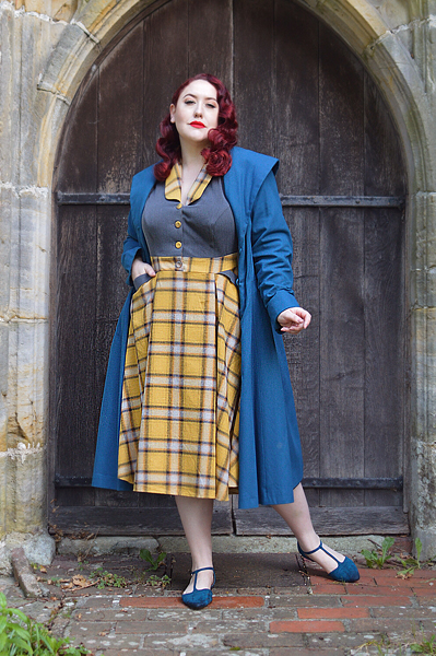 Plus size pinup Miss Amy May models the Isolde-Sun dress by Miss Candyfloss for a fit and size review
