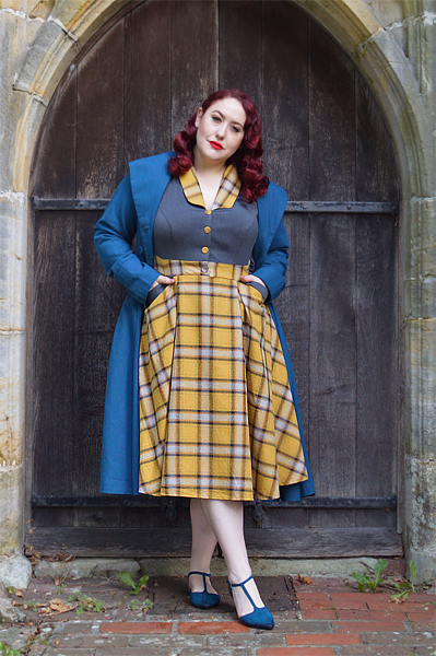 Plus size pinup Miss Amy May models the Isolde-Sun dress by Miss Candyfloss for a fit and size review