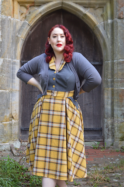 Plus size pinup Miss Amy May models the Isolde-Sun dress by Miss Candyfloss for a fit and size review