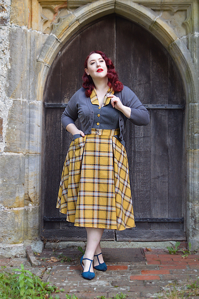 Plus size pinup Miss Amy May models the Isolde-Sun dress by Miss Candyfloss for a fit and size review