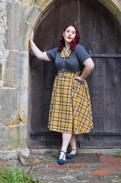 Plus size pinup Miss Amy May models the Isolde-Sun dress by Miss Candyfloss for a fit and size review