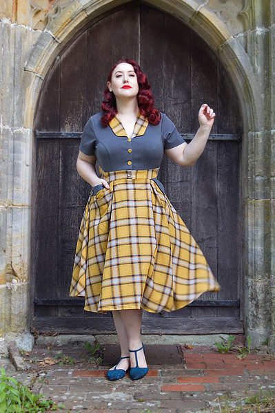 Plus size pinup Miss Amy May models the Isolde-Sun dress by Miss Candyfloss for a fit and size review