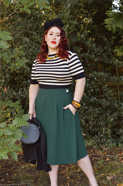 Plus size pinup Miss Amy May models the classic 1940s a-line skirt by Weekend Doll and the black and ivory striped Boatneck sweater by Pretty Retro for a fit and size review