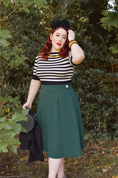 Plus size pinup Miss Amy May models the classic 1940s a-line skirt by Weekend Doll and the black and ivory striped Boatneck sweater by Pretty Retro for a fit and size review