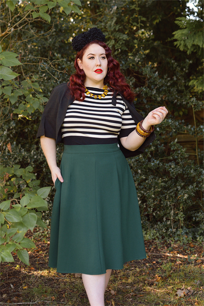 Plus size pinup Miss Amy May models the classic 1940s a-line skirt by Weekend Doll and the black and ivory striped Boatneck sweater by Pretty Retro for a fit and size review