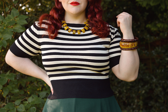 Plus size pinup Miss Amy May models the classic 1940s a-line skirt by Weekend Doll and the black and ivory striped Boatneck sweater by Pretty Retro for a fit and size review