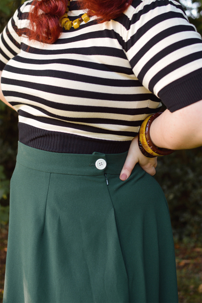 Plus size pinup Miss Amy May models the classic 1940s a-line skirt by Weekend Doll and the black and ivory striped Boatneck sweater by Pretty Retro for a fit and size review