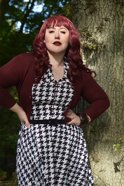 Plus size pinup Miss Amy May models the Blake Mid dress by Hell Bunny for a fit and size review