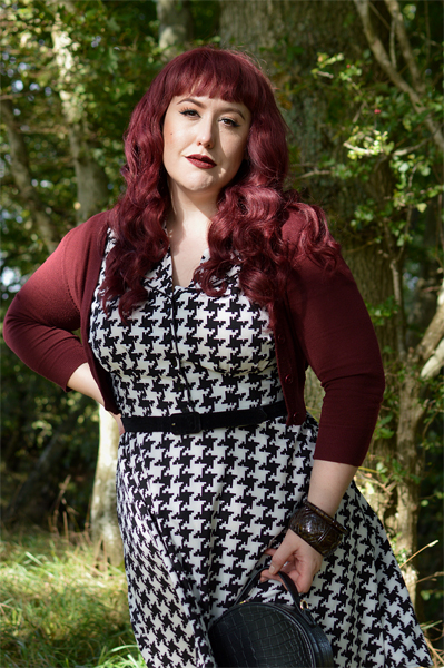 Plus size pinup Miss Amy May models the Blake Mid dress by Hell Bunny for a fit and size review