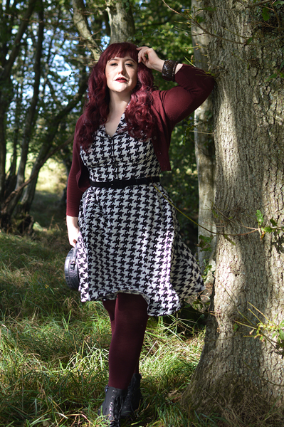 Plus size pinup Miss Amy May models the Blake Mid dress by Hell Bunny for a fit and size review