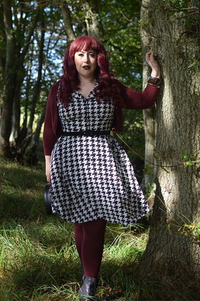 Plus size pinup Miss Amy May models the Blake Mid dress by Hell Bunny for a fit and size review