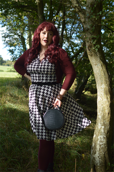 Plus size pinup Miss Amy May models the Blake Mid dress by Hell Bunny for a fit and size review