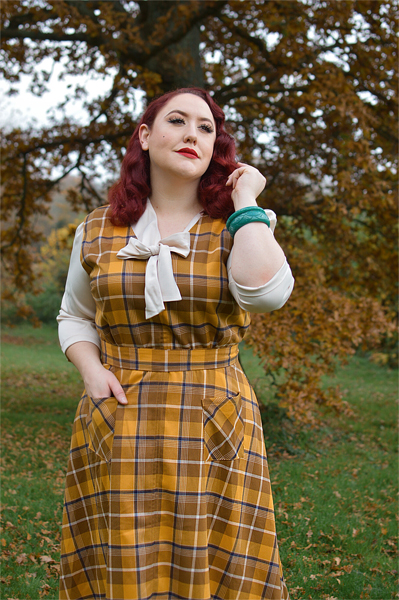 Plus size pinup Miss Amy May models the Jayleen Moonhill mustard check dress by Collectif Clothing for a fit and size review