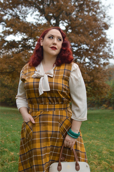 Plus size pinup Miss Amy May models the Jayleen Moonhill mustard check dress by Collectif Clothing for a fit and size review