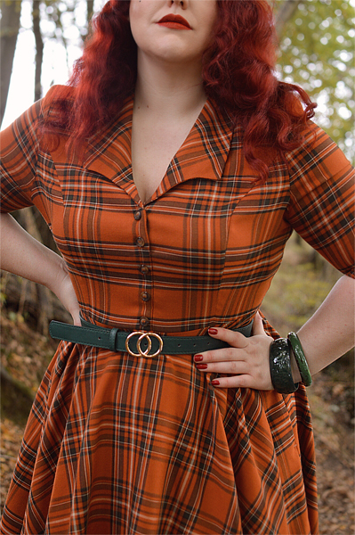 Plus size pinup Miss Amy May models the Tawny mid dress by Hell Bunny for a fit and sizing review