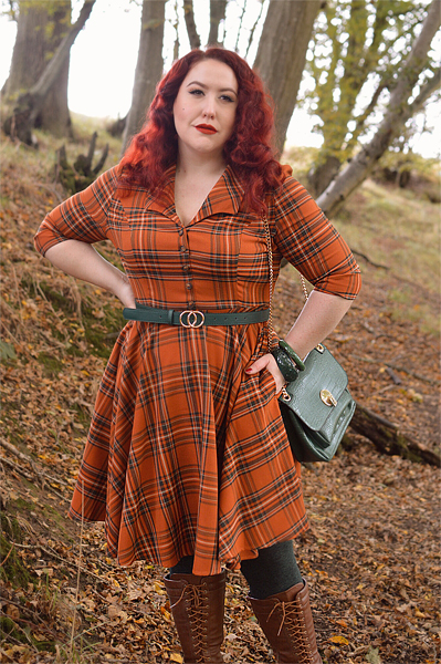 Plus size pinup Miss Amy May models the Tawny mid dress by Hell Bunny for a fit and sizing review