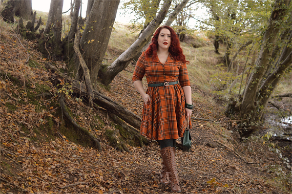 Plus size pinup Miss Amy May models the Tawny mid dress by Hell Bunny for a fit and sizing review