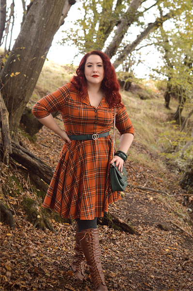 Plus size pinup Miss Amy May models the Tawny mid dress by Hell Bunny for a fit and sizing review