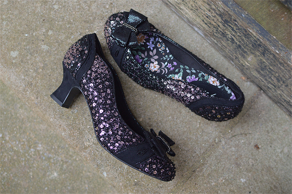 Pinup Miss Amy May models the black sequin Rhea low court heels and black sequin Alberta bag by Ruby Shoo for review