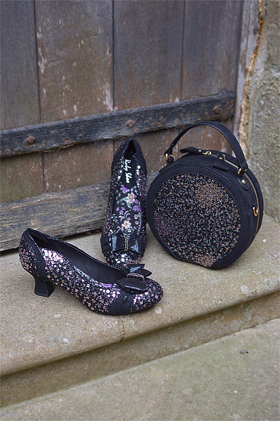 Pinup Miss Amy May models the black sequin Rhea low court heels and black sequin Alberta bag by Ruby Shoo for review