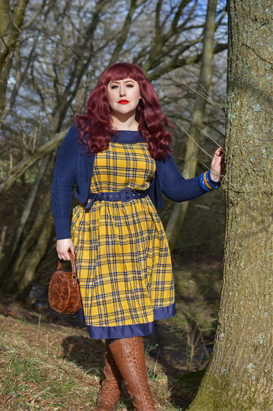 Plus size pinup Miss Amy May models the yellow and navy tartan Cindy circle skirt dress gifted by Dolly & Dotty for a fit and sizing review