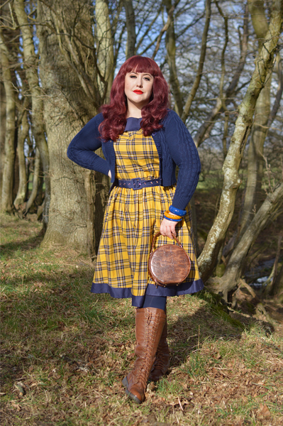 Plus size pinup Miss Amy May models the yellow and navy tartan Cindy circle skirt dress gifted by Dolly & Dotty for a fit and sizing review