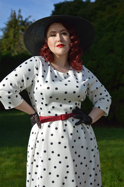 Plus size pinup Miss Amy May models the Black and white Polka dot Janet Beatrix dress by Dolly & Dotty for a fit and size review
