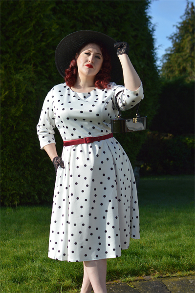 Plus size pinup Miss Amy May models the Black and white Polka dot Janet Beatrix dress by Dolly & Dotty for a fit and size review