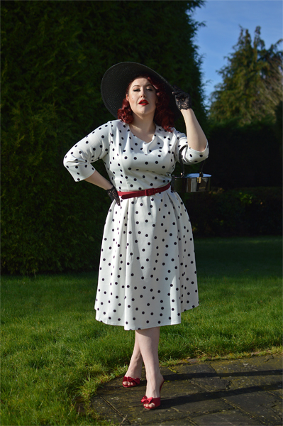 Plus size pinup Miss Amy May models the Black and white Polka dot Janet Beatrix dress by Dolly & Dotty for a fit and size review